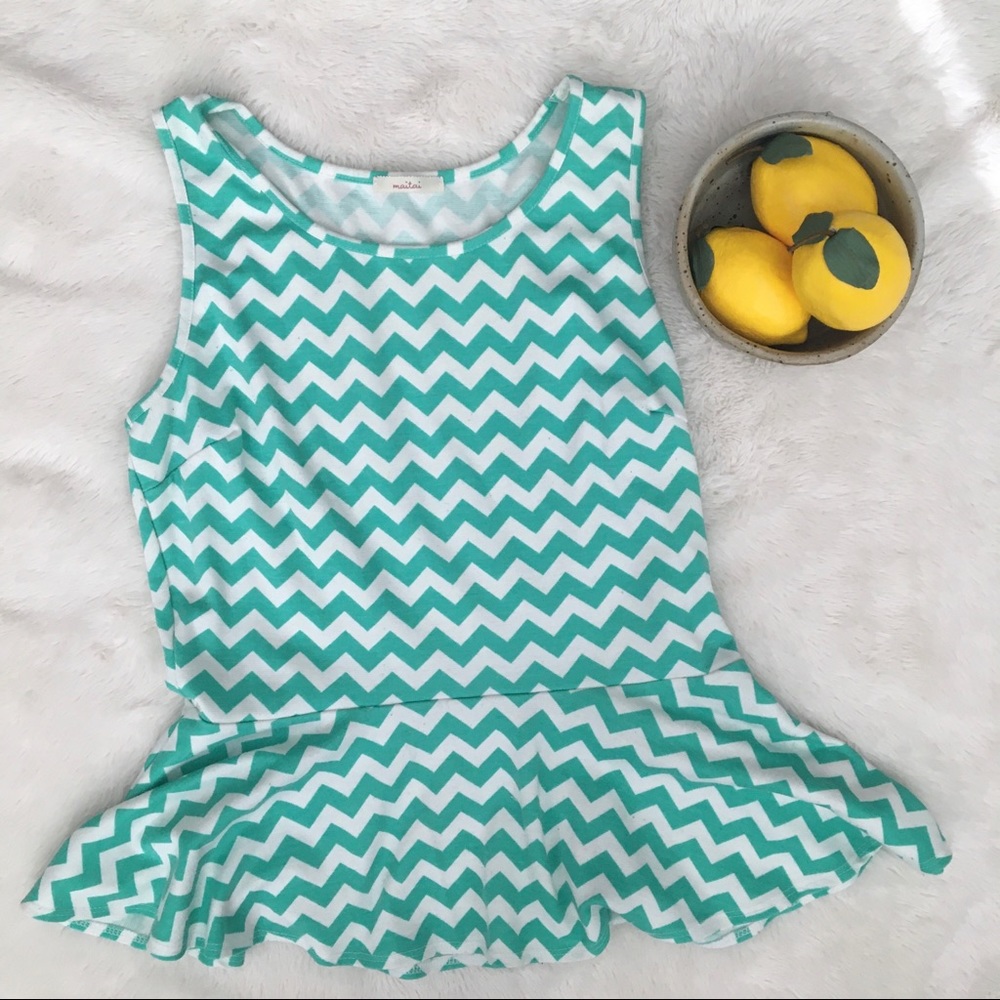 SOLD- Maitai Sleeveless Peplum Top